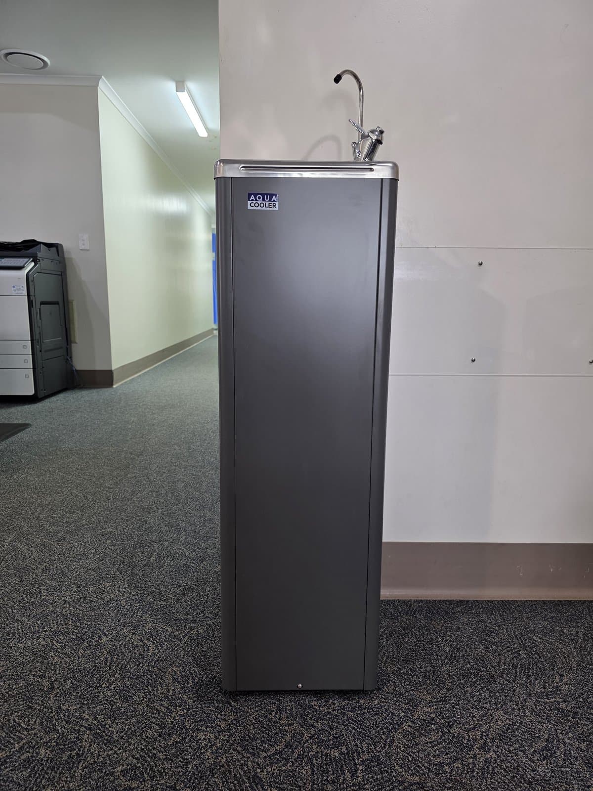 Side profile of installed Aqua Cooler commercial drink fountain at a Yeppoon medical practice