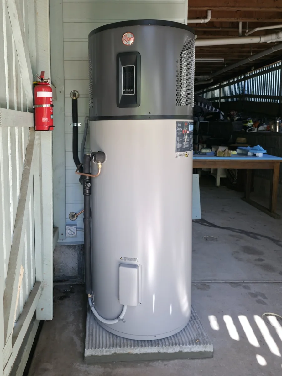 Rheem heat pump hot water system installed by LTH Plumbing in a Rockhampton garage